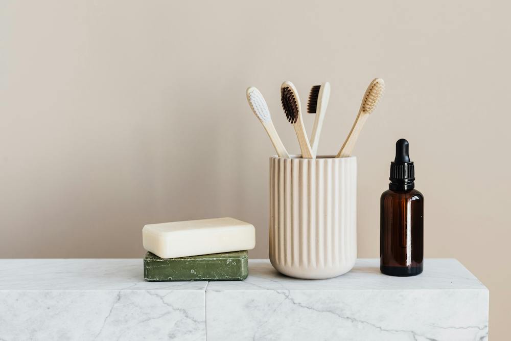 Sustainable soap and toothbrushes in pot